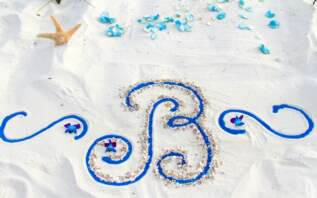 Barefoot Weddings unique sand monogram